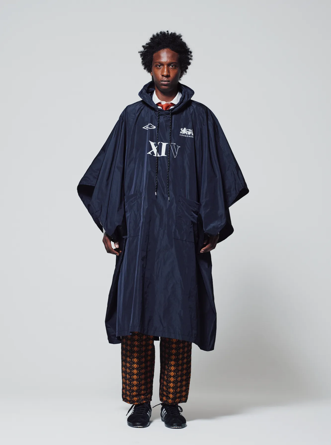 SUPPORTER PONCHO COAT BLACK